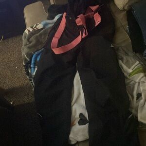 Snow pants with straps